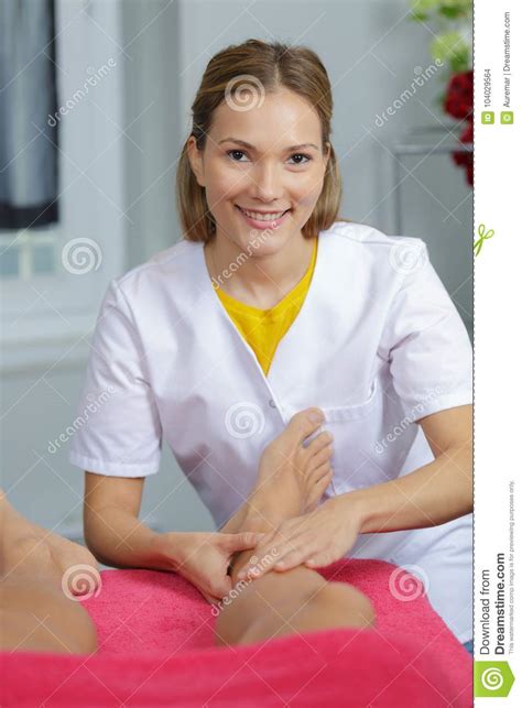 Woman Massaging Legs Man At Spa Center Stock Photo Image Of Pool