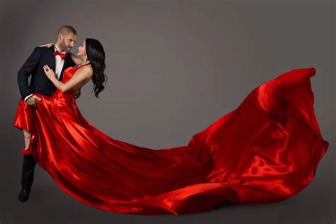 Elegant Couple Dancing In Love Woman In Red Clothes And Lover Man In Classic Suit Long Waving