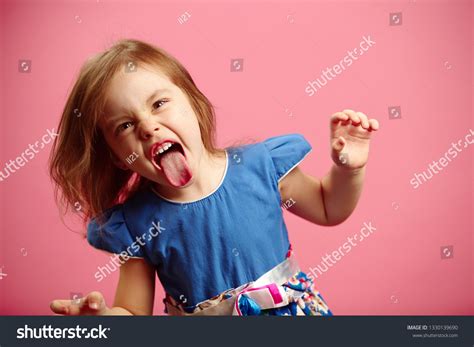 Angry Little Girl Shows Her Tongue Stock Photo 1330139690 Shutterstock