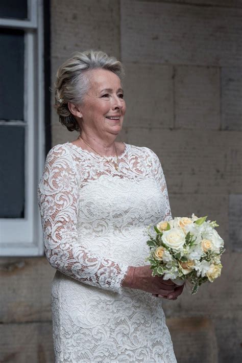 A Beautiful Lace Wedding Dress Which Was Backed With Sea Pearl