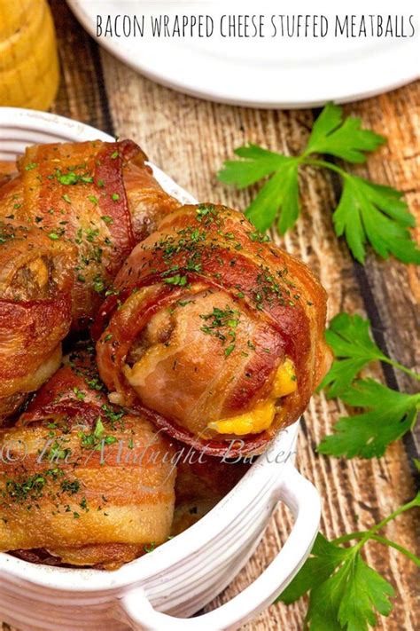 Bacon Wrapped Cheese Stuffed Meatballs In A White Dish With Parsley On