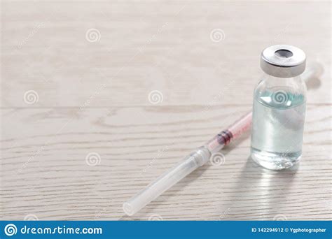 Bottle Of Vaccine And Syringe Stock Photo - Image of assorted, medical ...