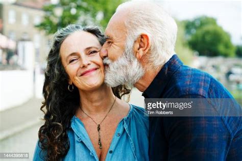 mature couple kissing stock fotos und bilder getty images