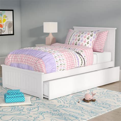 By raising the side panel of the bed to 16 from the floor there was more than enough clearance for the rolling trundle bed with a mattress to slide underneath. Platform Bed with Trundle | Trundle bed kids, Trundle bed ...