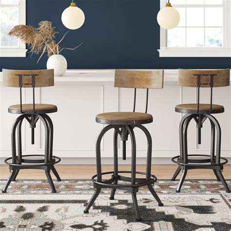 Choose kitchen island bar stools or kitchen island chairs that fit the space and are comfortable enough to sit in while you eat or work. Nathan Swivel Adjustable Height Bar Stool & Reviews | Joss ...