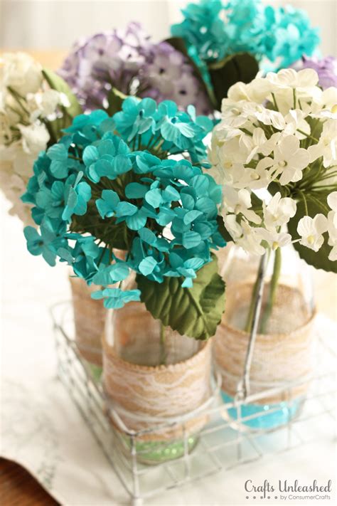 The medium 6 inch flowers were pretty similar to the 8 inch ones, but had a few small tweaks to make them a bit more unique, we had maybe 4 different styles i hope you like these centerpieces as much as we do! DIY Centerpieces: Spring Floral Vases - Crafts Unleashed