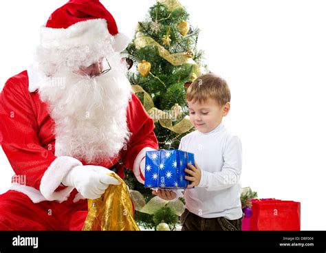 Santa Claus Giving Christmas Ts To Child Stock Photo Alamy
