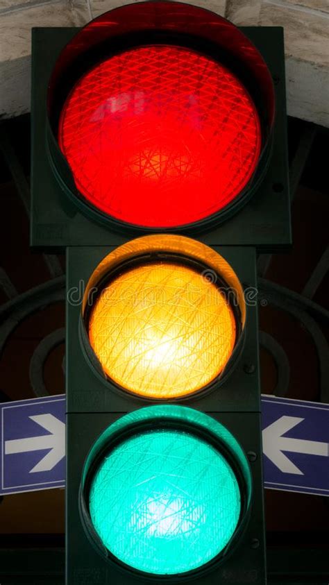 Vertical View Of A Traffic Light With All The Lights On Bari S Stock