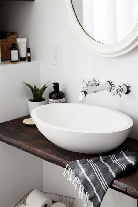 Countertops are one of the biggest expenses of a kitchen remodel, and the price for solid stone can cause quite the sticker shock! DIY Floating Bathroom Vanity | DIYIdeaCenter.com