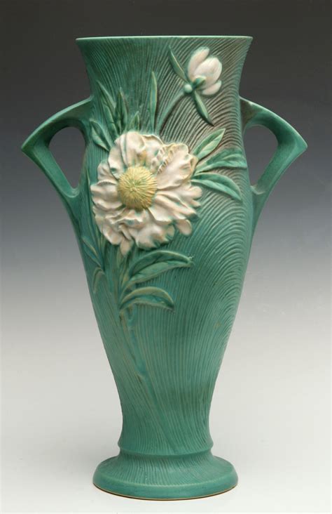 The inch in to centimeter cm conversion table and conversion steps are also listed. #31: A ROSEVILLE 'PEONY' 18-INCH FLOOR VASE