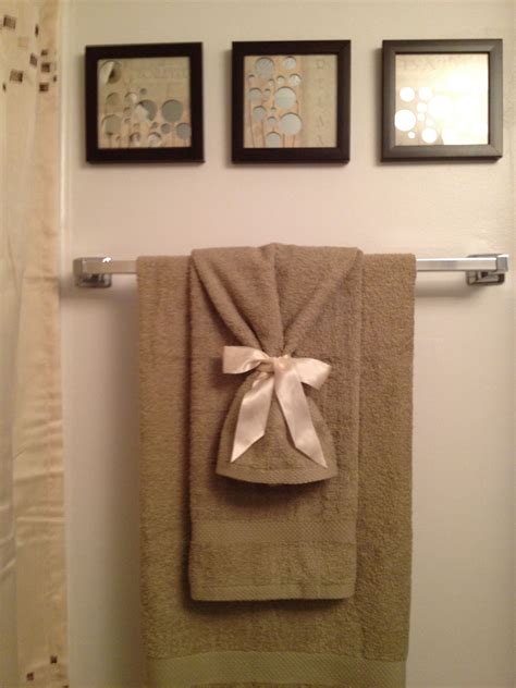 Use Ribbon Tied Around Towels Bathroom Towel Decor Bathroom Decor