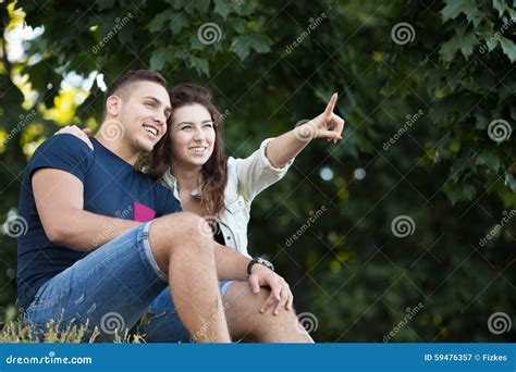 Couple Relaxing In Park Stock Image Image Of Embracing 59476357