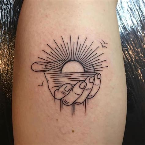 Outline Black Tattoo Of A Sunset In A Hand Palm Beachsunsettattoo
