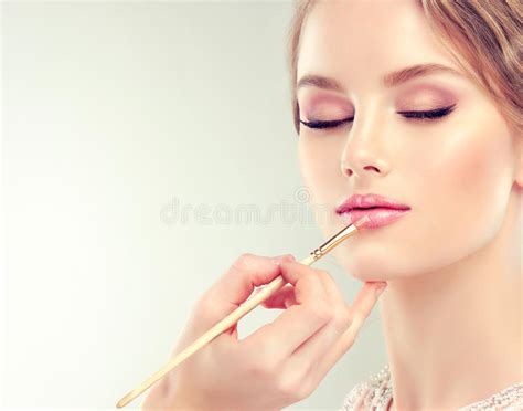 Make-up in Progress. Beautification. Stock Image - Image of hair, gown ...