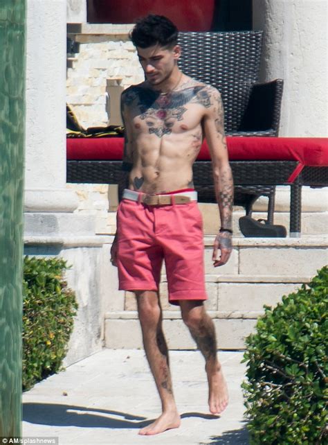 Zayn Malik Displays His Tattoos As He Goes Shirtless In Miami Daily