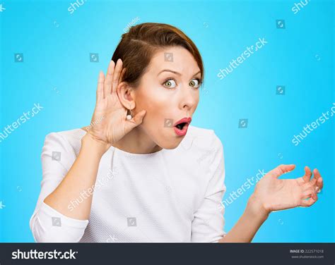 Closeup Portrait Young Nosy Woman Hand To Ear Gesture Trying Carefully