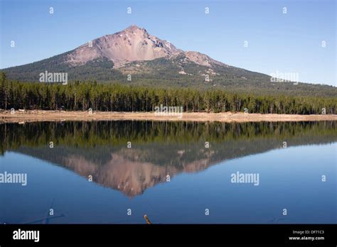 Four Mile Lake Shows A Nearly Perfect Reflection For Mt Mcloughlin