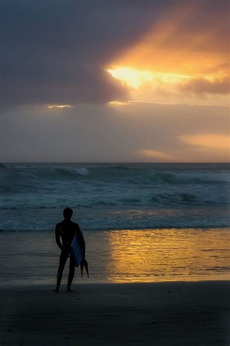 Free Images Man Beach Sea Coast Sand Ocean Horizon Sunrise Sunset Bench Sunlight