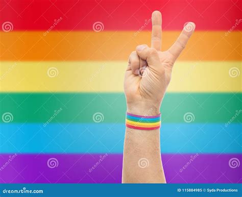 Hand With Gay Pride Rainbow Wristband Make Peace Stock Image Image Of Relationships Casual