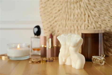 Beautiful Female And Male Body Shaped Candles On Wooden Table Stylish