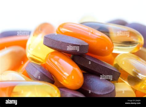 Vitamins And Healthy Supplements On White Background Stock Photo Alamy