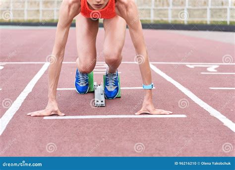 Serious Runner Standing At Starting Line Stock Photo Image Of Slim