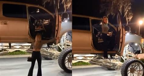 Watch Woman Stuns Viewers Climbing Into Ludicrously Jacked Up Pickup