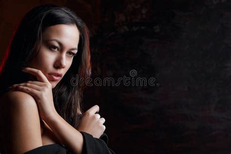 Closeup Portrait Of Seductive Model With Naked Shoulders Posing With Red Light Space For Text