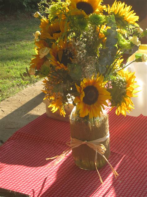 Sunflowers In A Mason Jar Tied With Burlap And Raffia Wedding Ideas