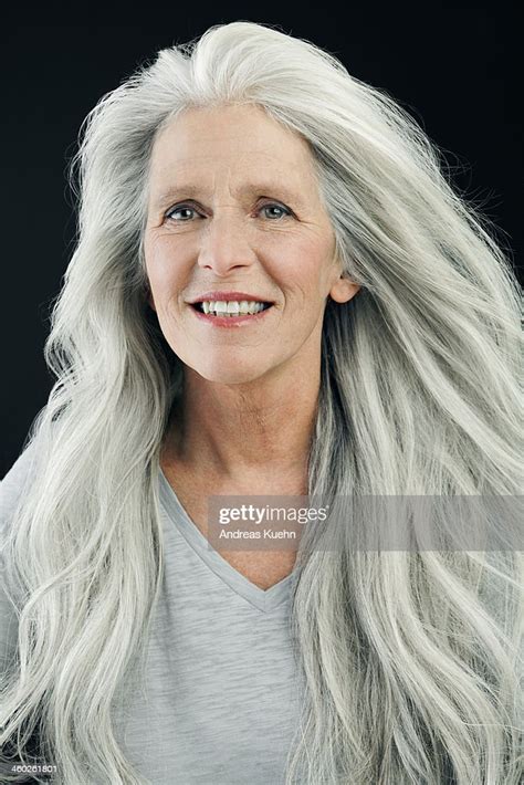 Mature Woman With Wind Blown Long Gray Hair Photo Getty Images