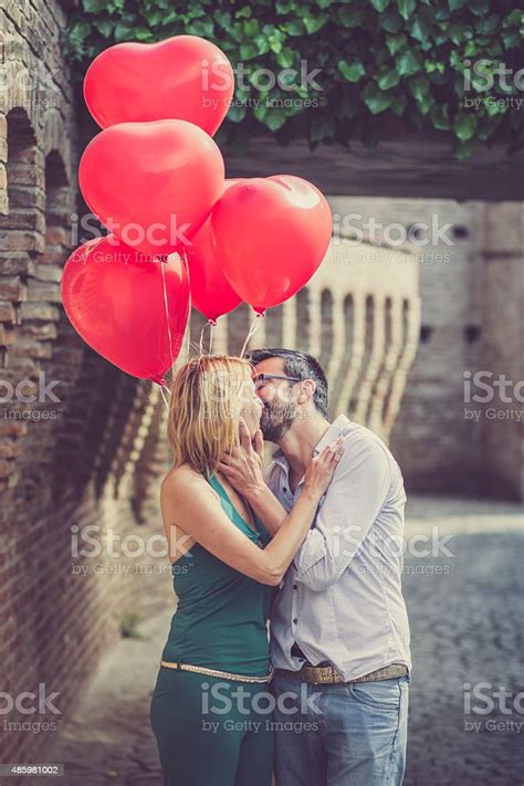 Romantic Couple Kissing Outdoors Stock Photo Download Image Now