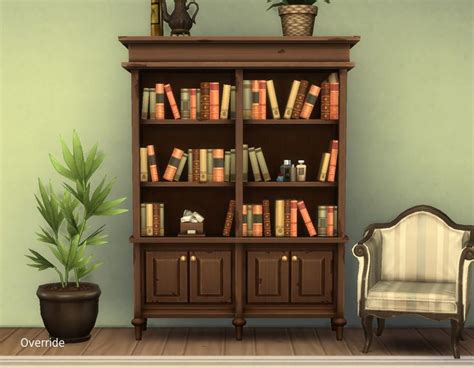A Room With A Chair Bookcase And Potted Plant On The Floor In Front Of It