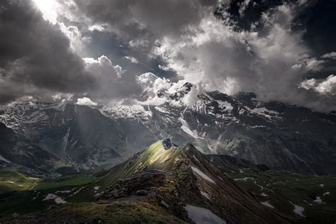 A woman stands on the rocky sunbeams and storm clouds over appalachian mountains from blue r. Clouds over the Mountains HD Wallpaper | Background Image ...