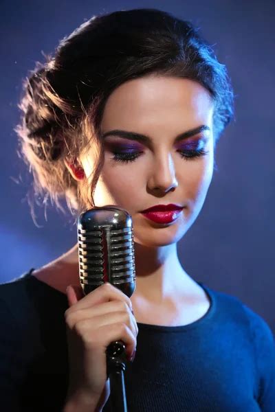 Beautiful Woman Singing Stock Photo By ©belchonock 103307298