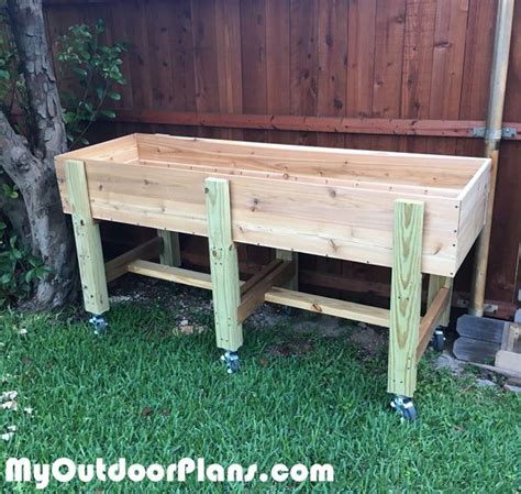 The box, the irrigation system, the vegetables. DIY Waist high Garden Bed | Raised garden bed plans, High raised garden beds, Raised garden beds