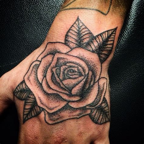 Rose Hand | Hand tattoos for guys, Tattoos for guys, Hand tattoos