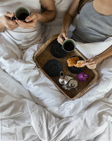 Couple Drinking Coffee In Bed By Stocksy Contributor Visualspectrum