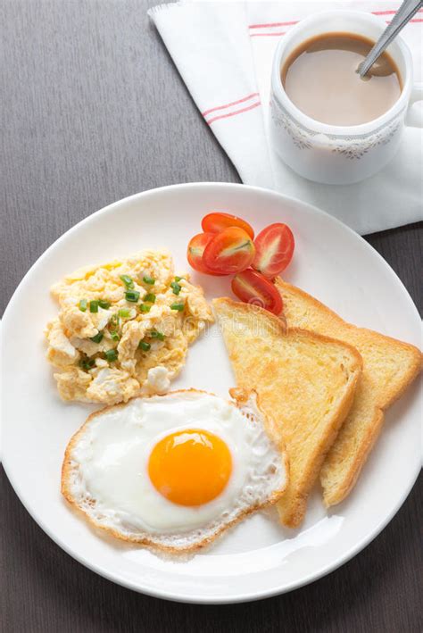 Breakfast Coffee Fresh Fried Egg And Scrambled Egg With Bread Stock