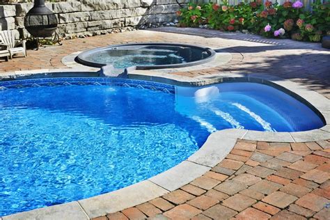 Adding A Hot Tub To Your Swimming Area Photo Remodeling Analysis