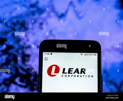 Lear Corporation Manufacturing Company Logo Seen Displayed On Smart