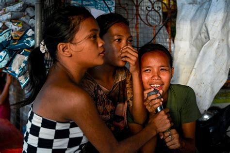 we love singing filipinos find joy in karaoke