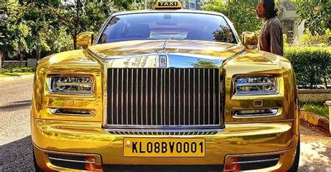 A Gold Plated Rolls Royce Phantom Being Used As A First Class Taxi