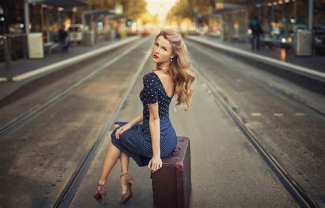 1400x900 Blonde Girl Sitting Suitcase Train Station 4k 1400x900 Resolution Hd 4k Wallpapers