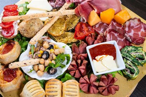 Mixed Antipasto Platter With Cold Cuts And Legumes And Cheeses Stock