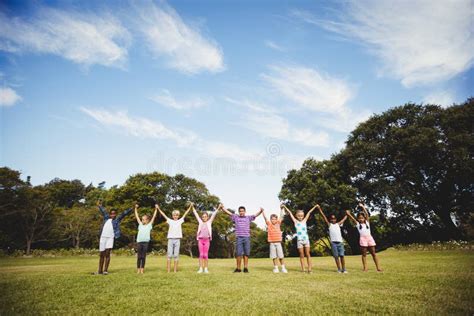 Smiling Kids Posing Together During A Sunny Day Stock Photo Image Of