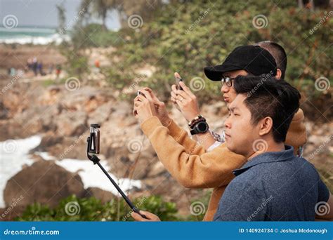 Traveling Asian Tourists Taking Pictures Editorial Stock Image Image Of Coastal Asian 140924734