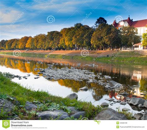 Autumn City Landscape With Reflection In The River Stock Photo Image