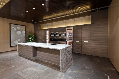 Modern light wood kitchen cabinets with white marble countertop. 50 High-End Dark Wood Kitchens (Photos) - Designing Idea