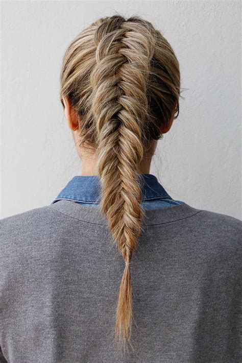 Continue taking small sections of hair and combining it with the opposite part all the way down. How to Get an Inverted Fishtail Braid That's Sure to ...