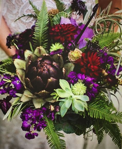 Ferns and petals wedding bouquets. Artichoke, fern, succulent and dahlia wedding bouquet ...